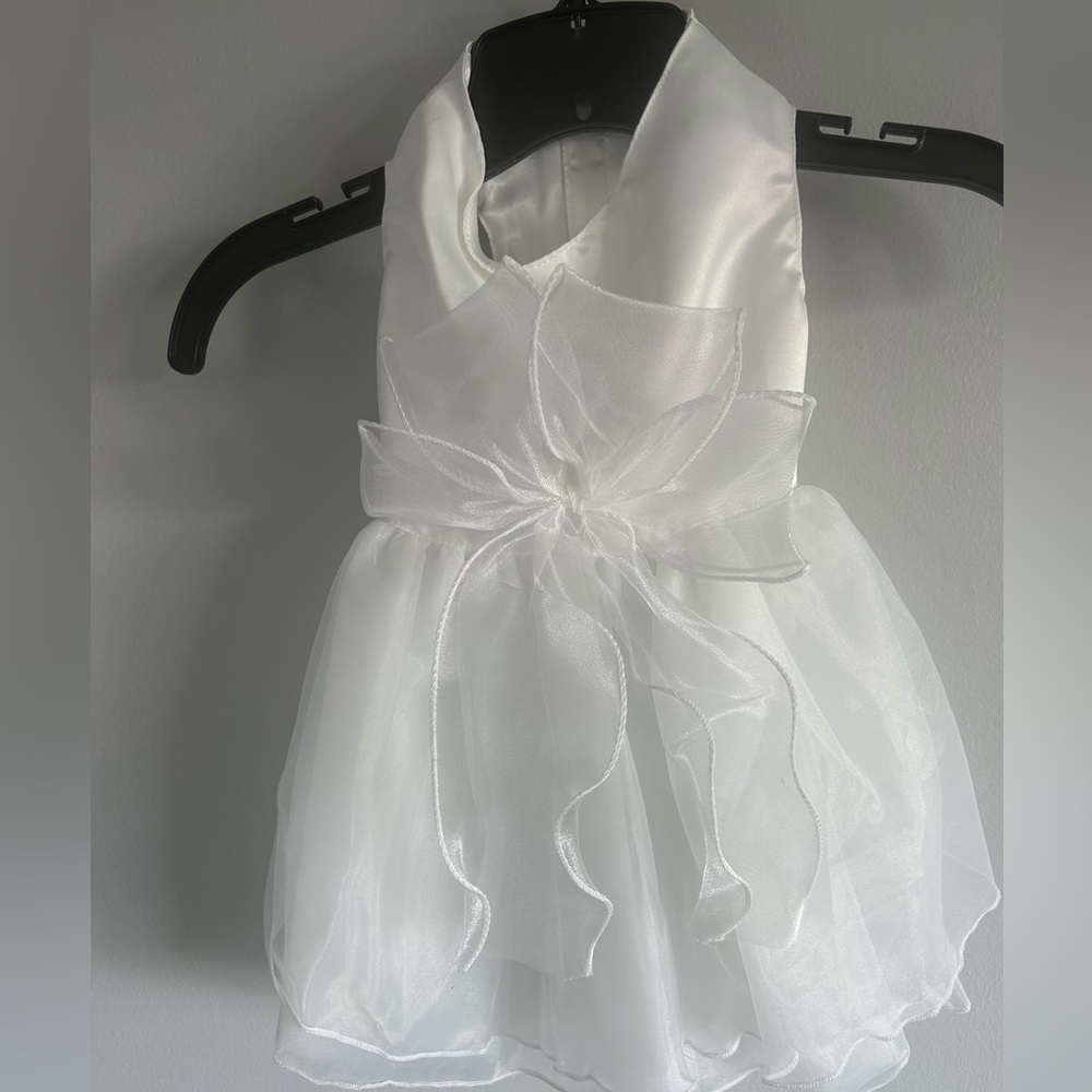 New w/tags dog wedding dress w/ satin & tulle. XL more like a medium.